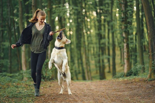 Portrait of a woman with her beautiful dog